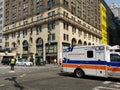 NewYorkÃ¢â¬âPresbyterian Hospital Ambulance, NYPD Traffic Officer, New York City, NYC, NY, USA Royalty Free Stock Photo